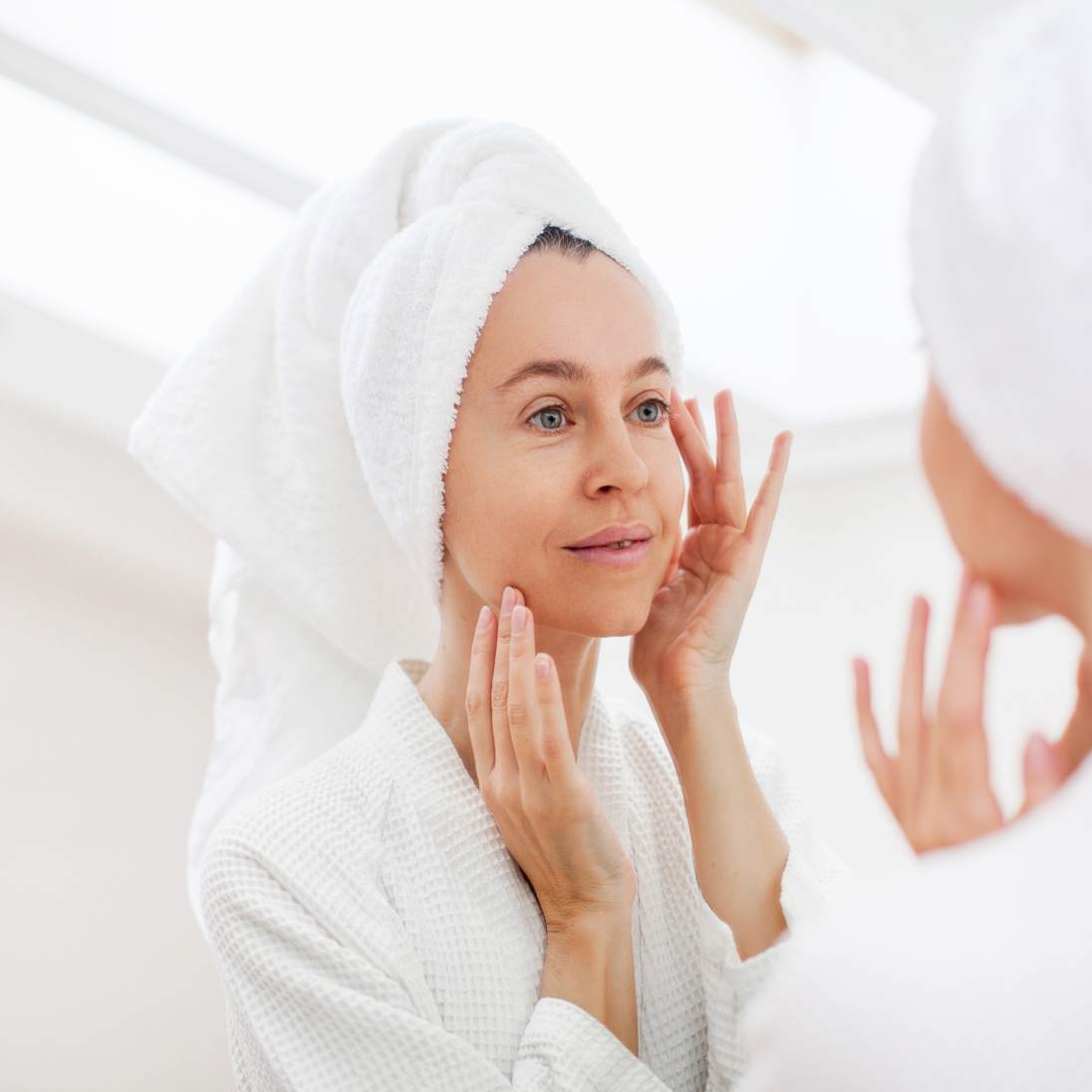 Woman looking at mirror